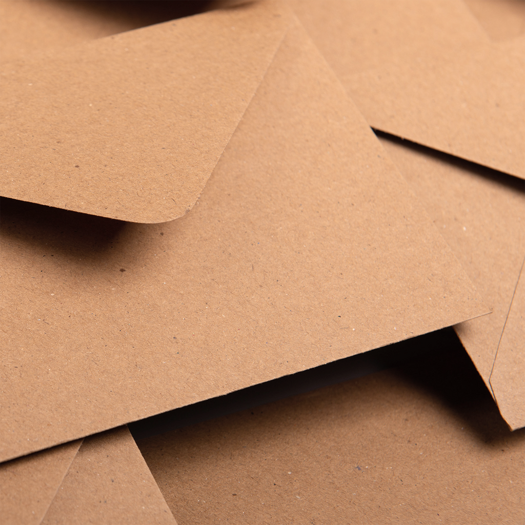 Funny birthday greeting card for a stepmum featuring a dictionary-style definition quote on sustainable recycled cardstock, paired with a brown Kraft envelope.