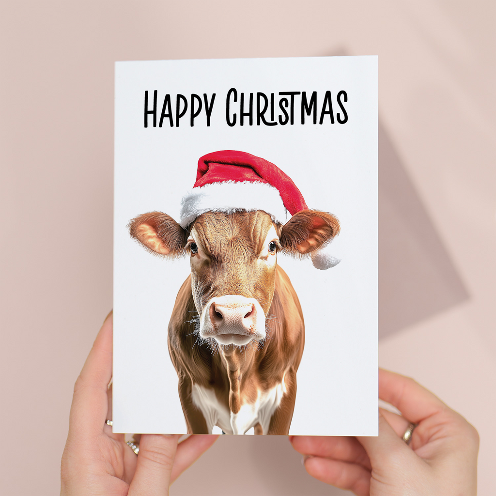 Whimsical Christmas Card Featuring a Cow Wearing a Santa Hat, Eco-Friendly Material, For Him or Her
