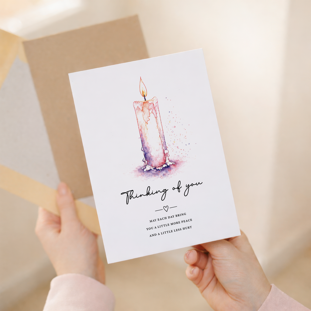 Thinking of you sympathy card featuring a lit watercolour candle and comforting message.