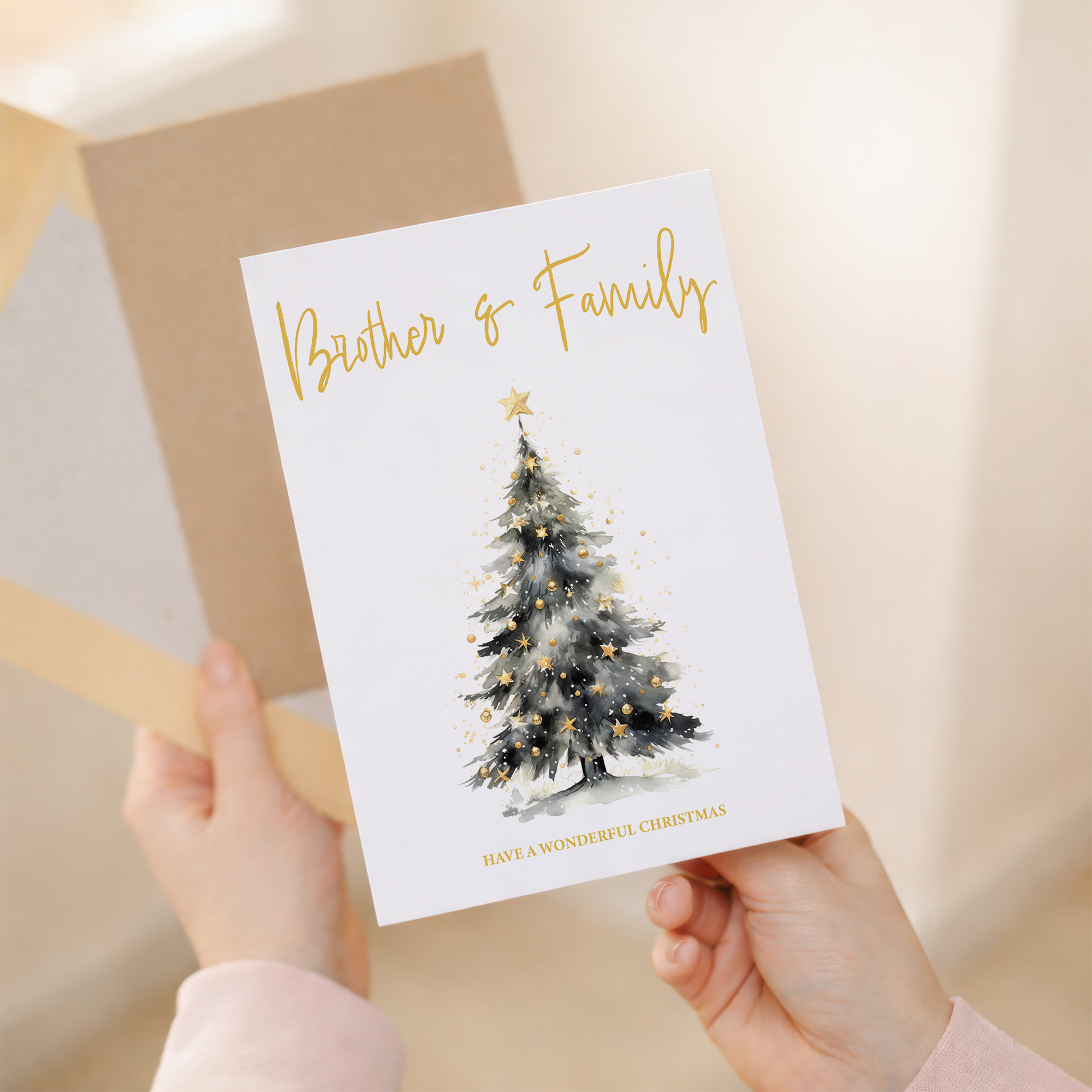 Festive Christmas card featuring a classic Christmas tree design for a brother and his family.