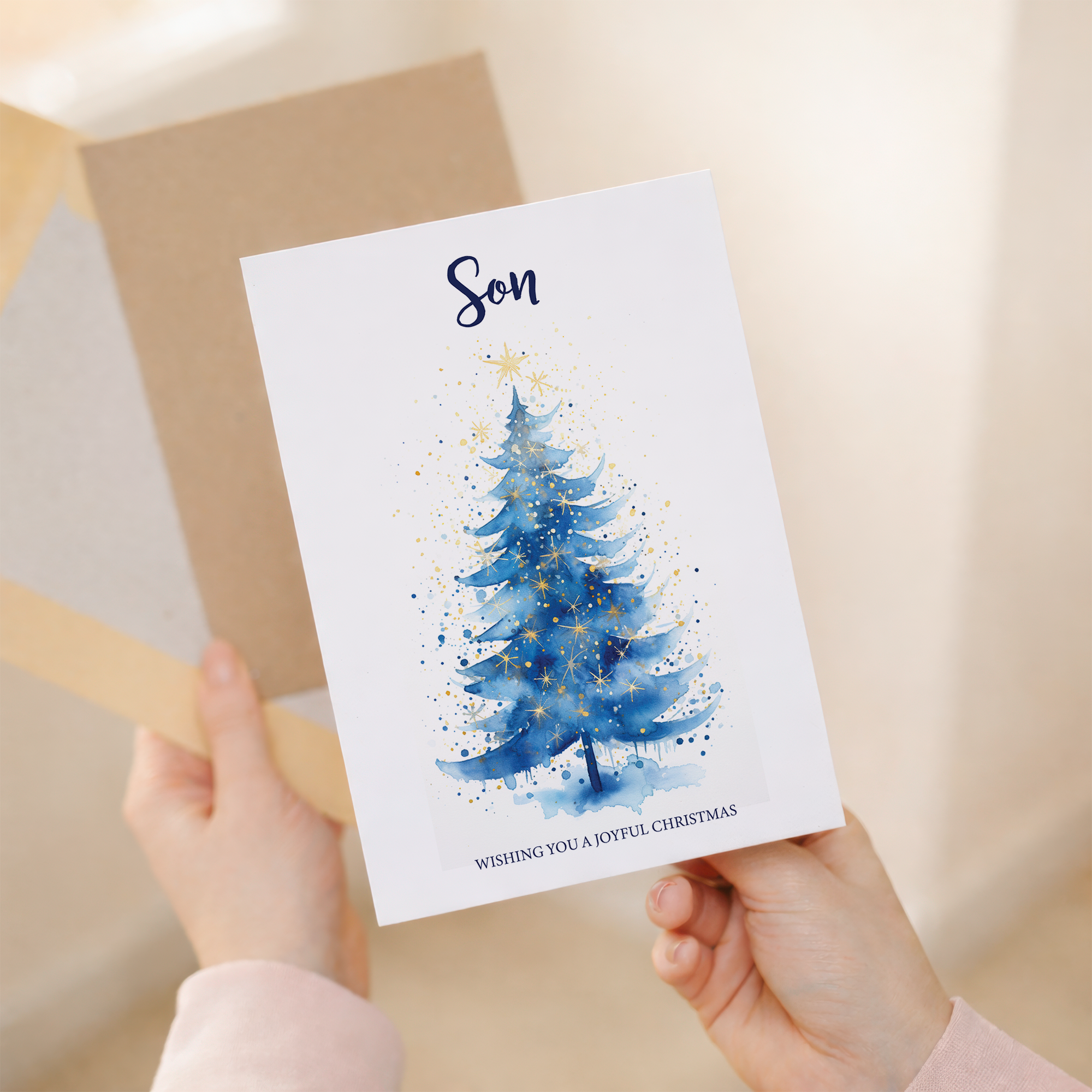 Minimalist Christmas greeting card for a son featuring a festive green Christmas tree design on a white background.