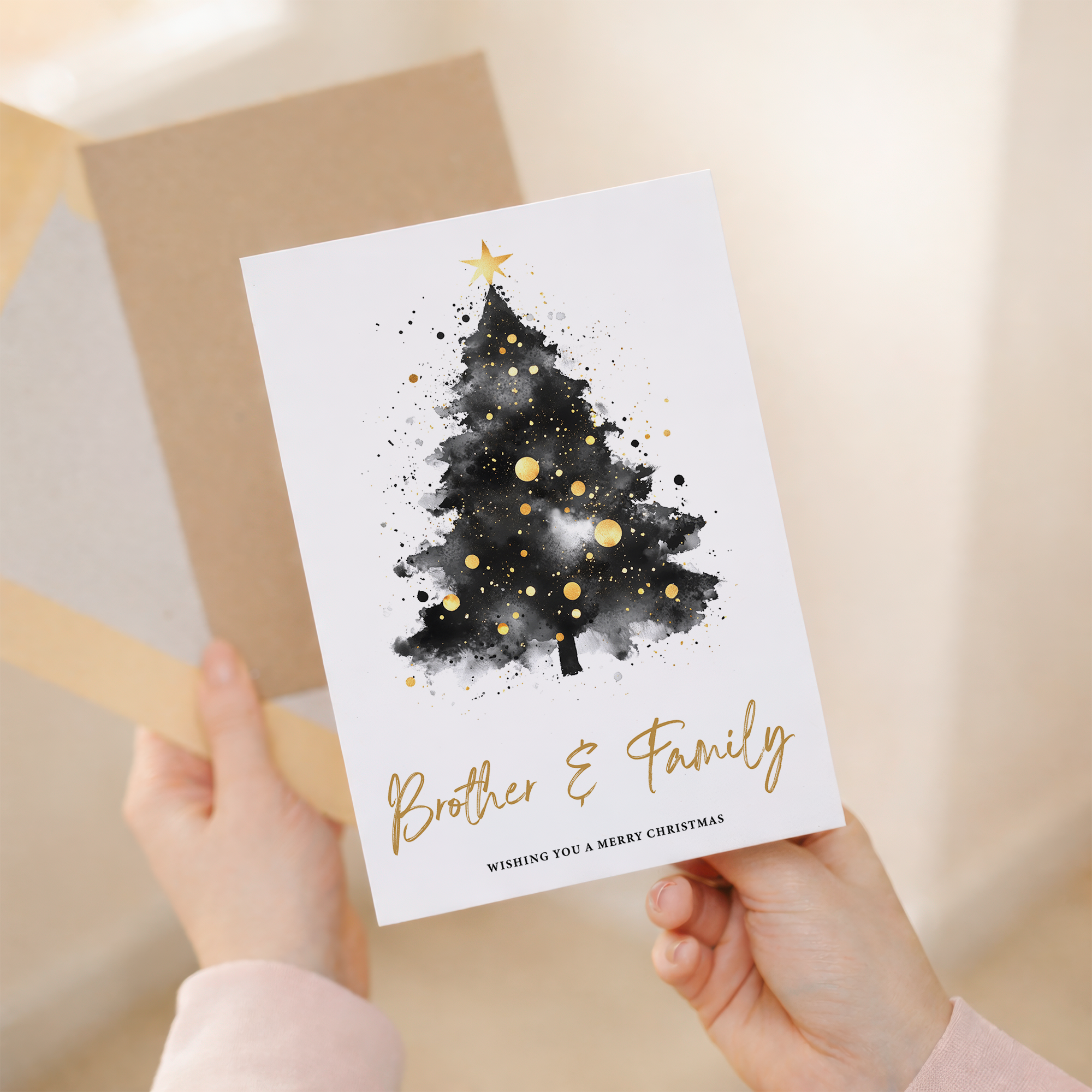 A festive Christmas greeting card featuring a decorated green Christmas tree with a golden star on top, set against a clean background, designed for a brother and his family.