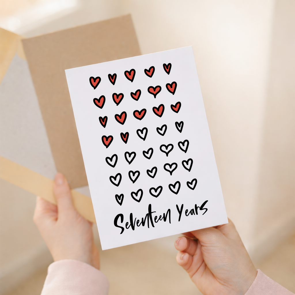 Elegant 5x7 inch 17th Wedding Anniversary greeting card featuring a romantic design on sustainable recycled cardstock, paired with a rustic brown Kraft envelope.