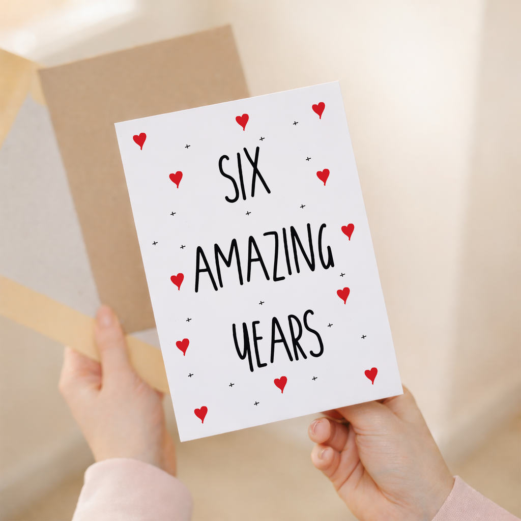 Elegant 6th wedding anniversary greeting card with a simple, modern design on recycled cardstock, accompanied by a sustainable brown Kraft envelope.