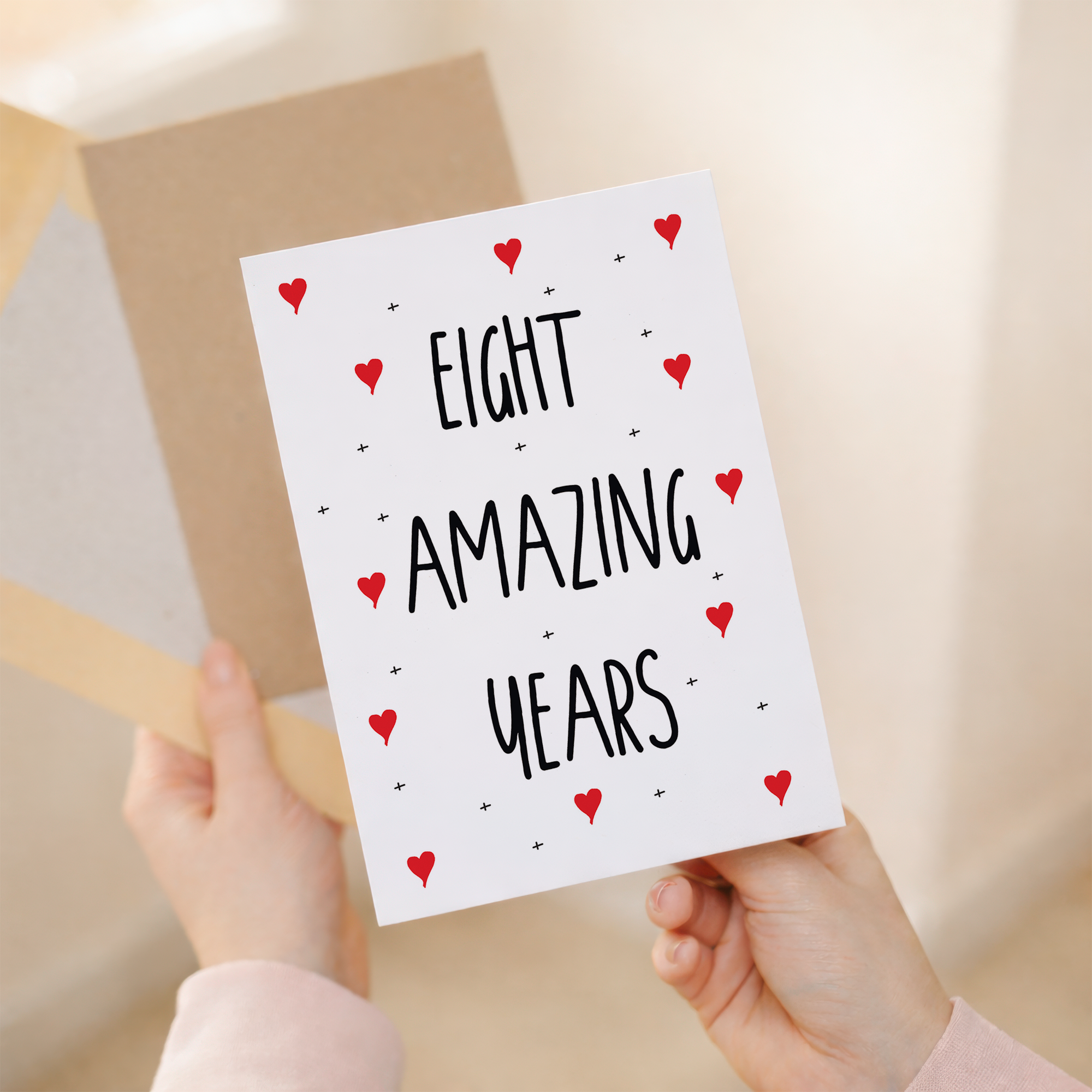 Elegant 8th wedding anniversary greeting card on sustainable recycled cardstock, paired with a rustic brown Kraft envelope.