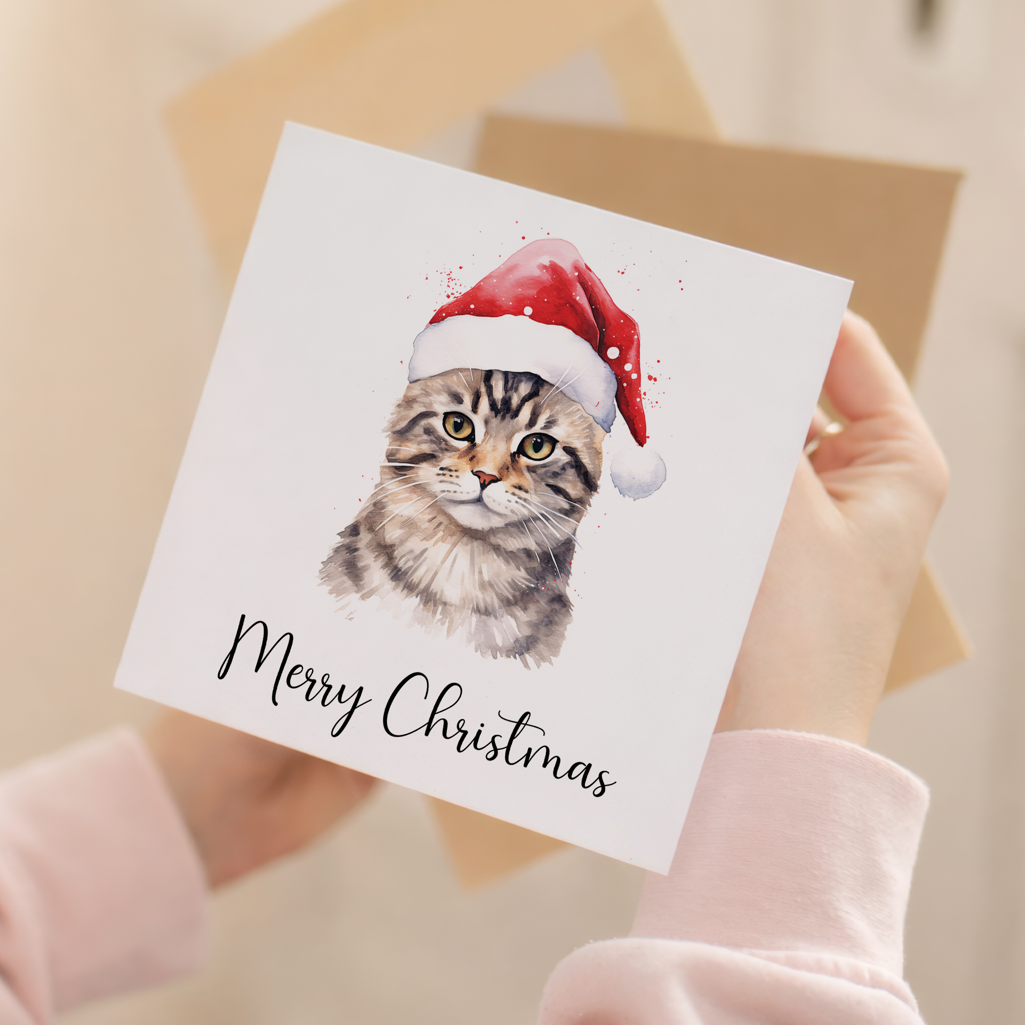 Fun Christmas Card of a Tabby Cat Wearing A Santa Hat Whimsical Watercolour Christmas Card For Animal Lover For Him or Her