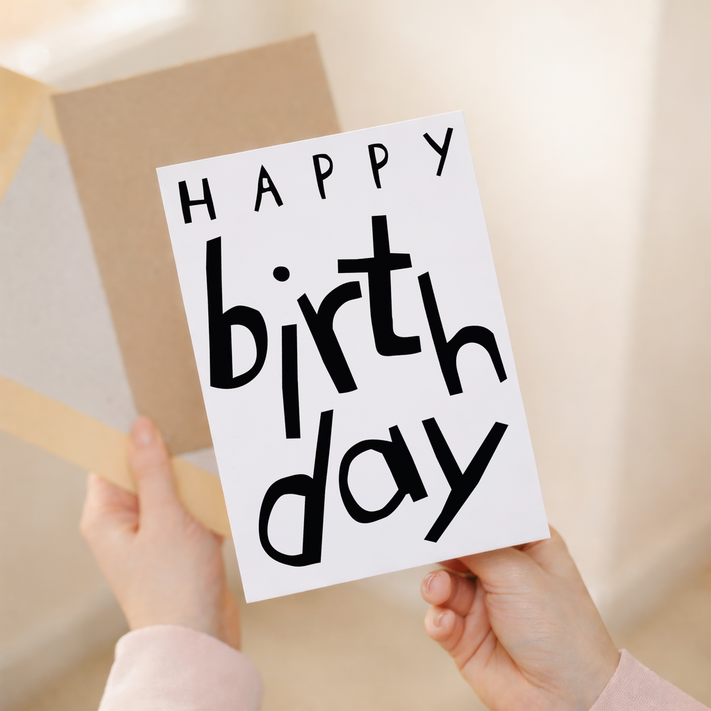 Charming birthday greeting card featuring an animal-themed illustration on sustainable recycled cardstock, paired with a brown Kraft envelope.