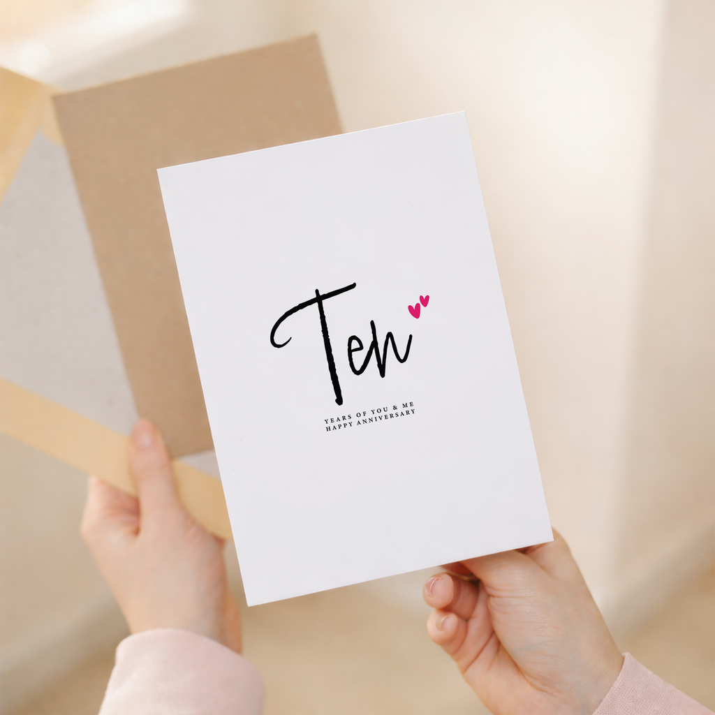 A romantic Ten Year Anniversary greeting card for a partner featuring a clean letters and numbers design on a white background.