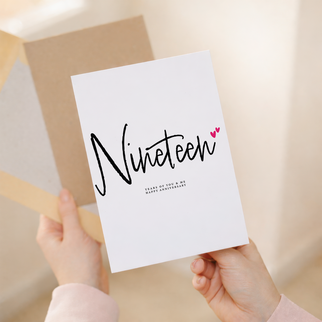 A realistic illustration of two giraffes with their necks intertwined, forming a heart shape, on a 19th wedding anniversary greeting card.