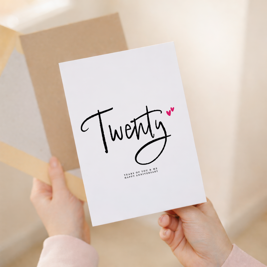 Elegant 20th wedding anniversary greeting card featuring a charming British Shorthair cat illustration on eco-friendly cardstock, accompanied by a rustic brown Kraft envelope.