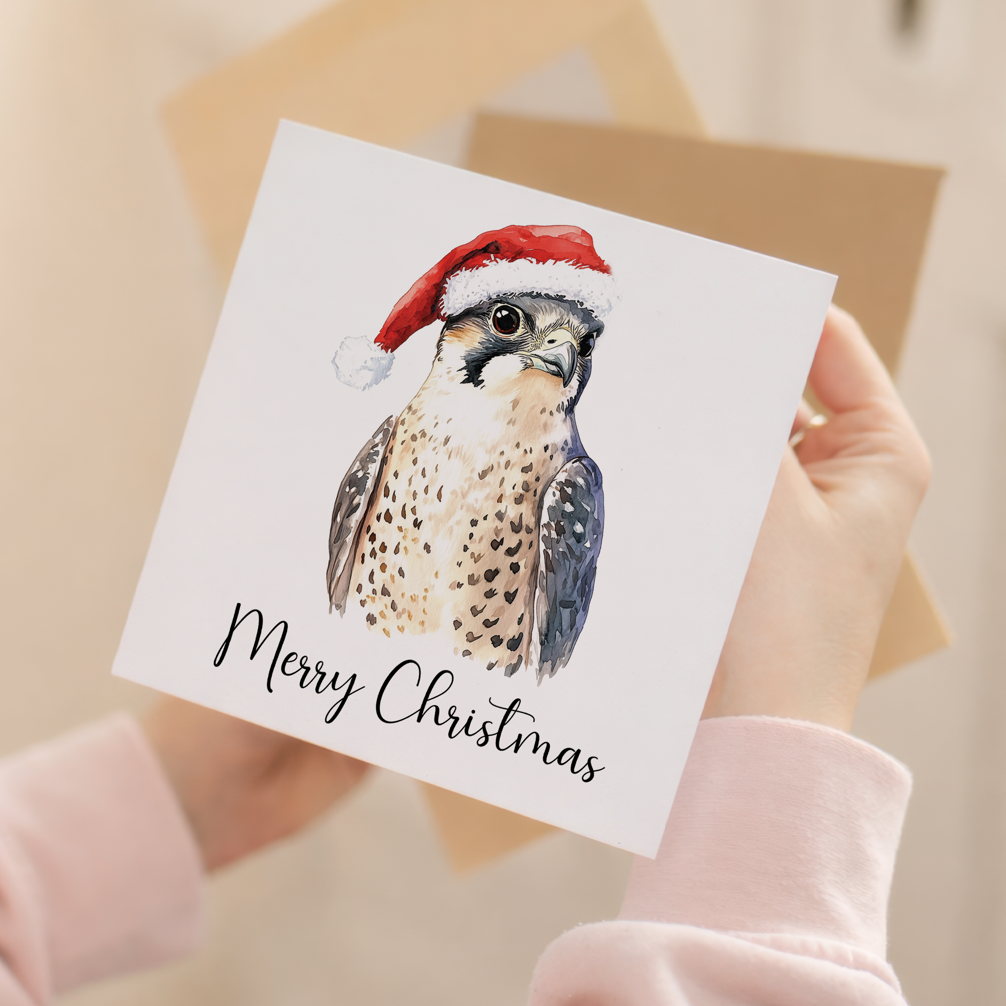 Fun Christmas Card of a Peregrine Falcon Wearing A Santa Hat Whimsical Watercolour Christmas Card For Bird Lover For Him or Her