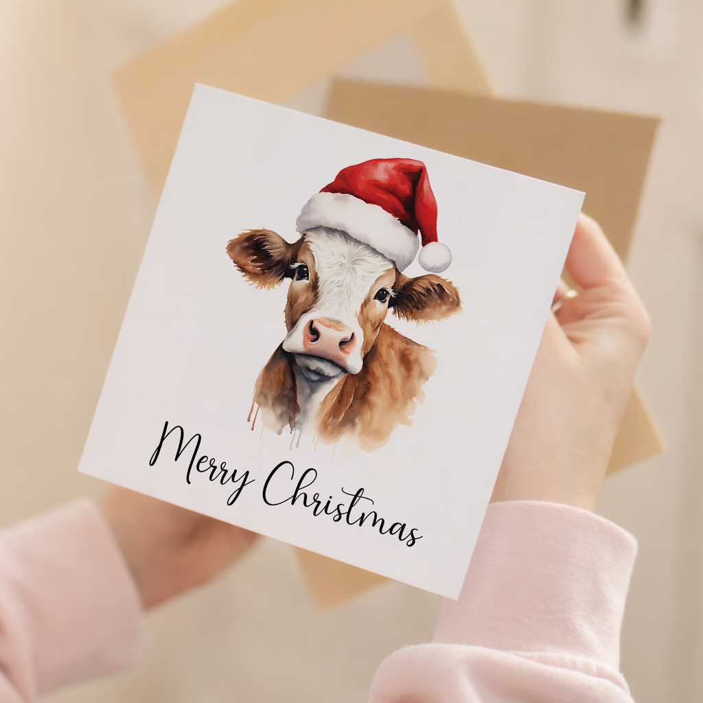 Fun Christmas Card of a Cow Wearing A Santa Hat Whimsical Watercolour Christmas Card For Animal Lover For Him or Her