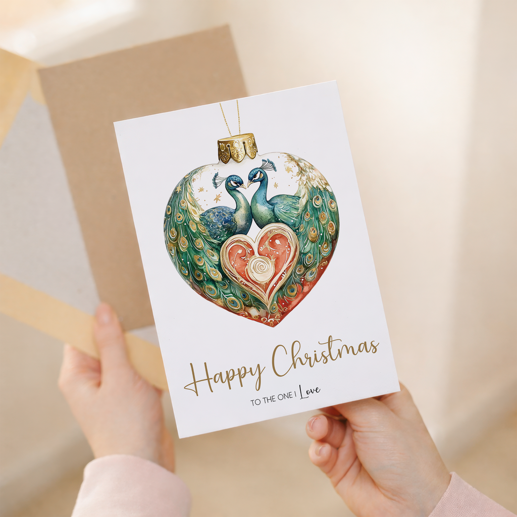 A romantic 5x7 Christmas card featuring an elegant peacock bauble design with festive decorations, perfect for a partner, wife, husband, boyfriend, or girlfriend.