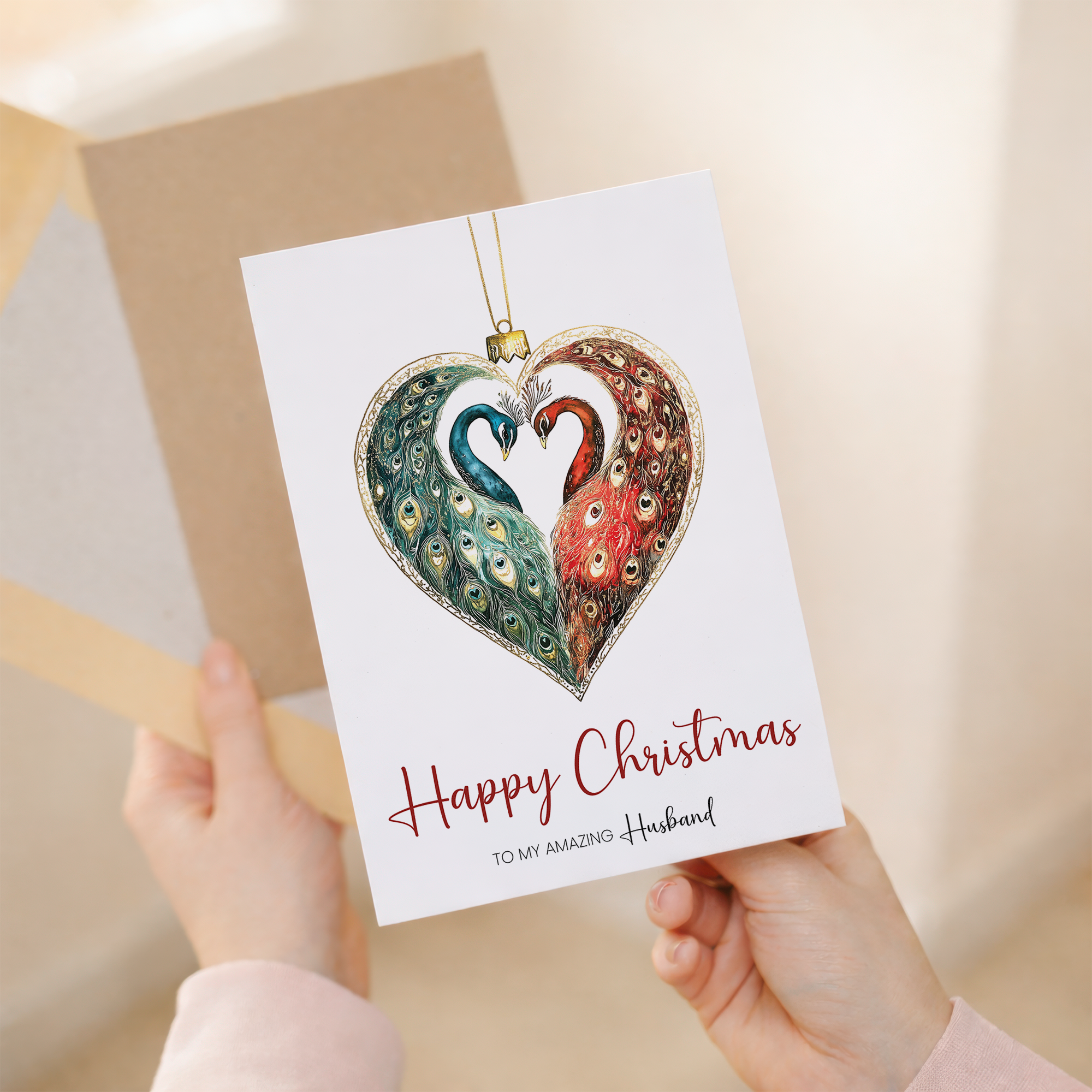 Christmas card for husband featuring a decorative peacock-themed holiday bauble design.