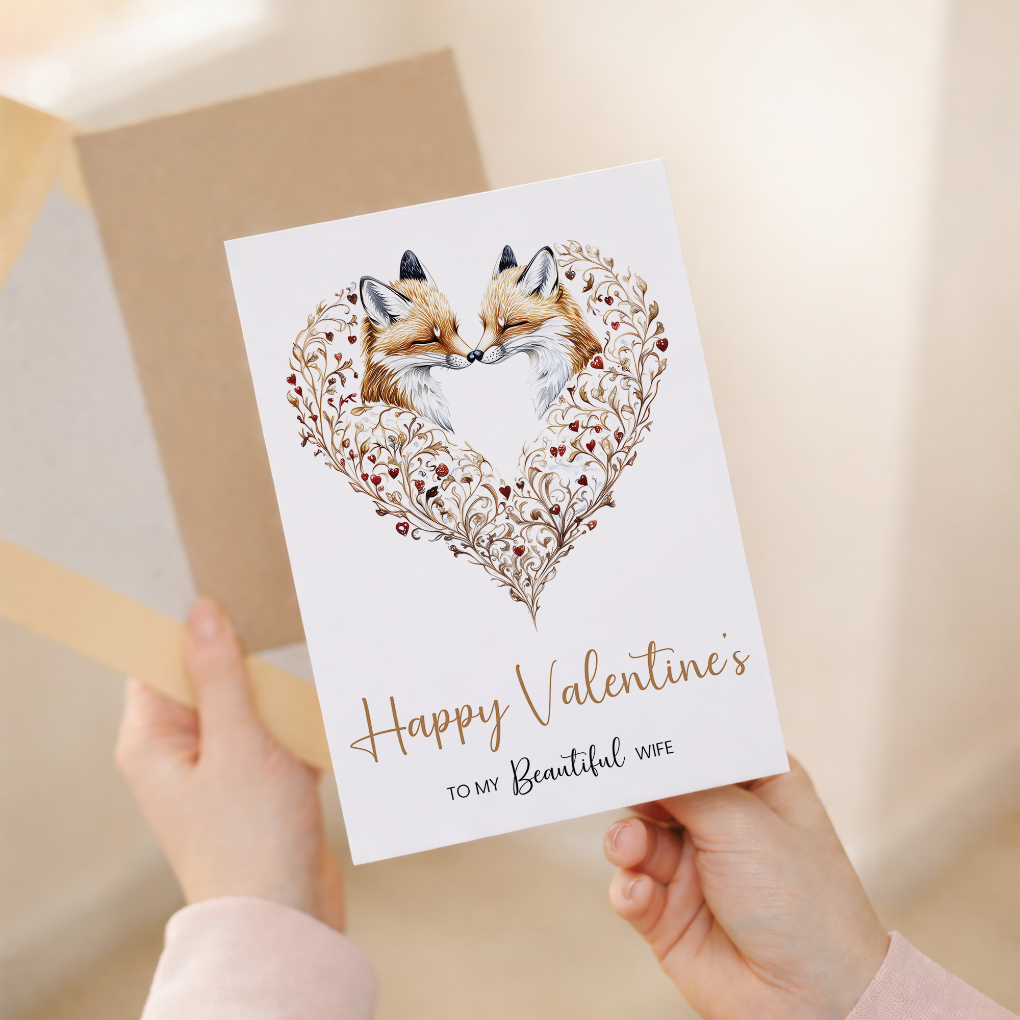 An elegant Valentine's Day greeting card for a wife featuring a unique artistic fox heart design in warm tones, presented on a white background with a brown kraft envelope.