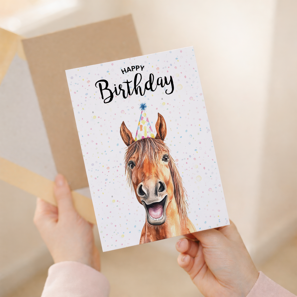 Watercolor illustration of a horse on a white birthday greeting card.