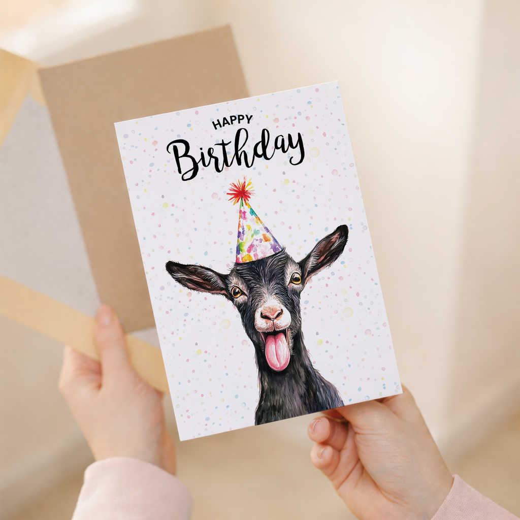 Watercolor goat illustration on a birthday greeting card.