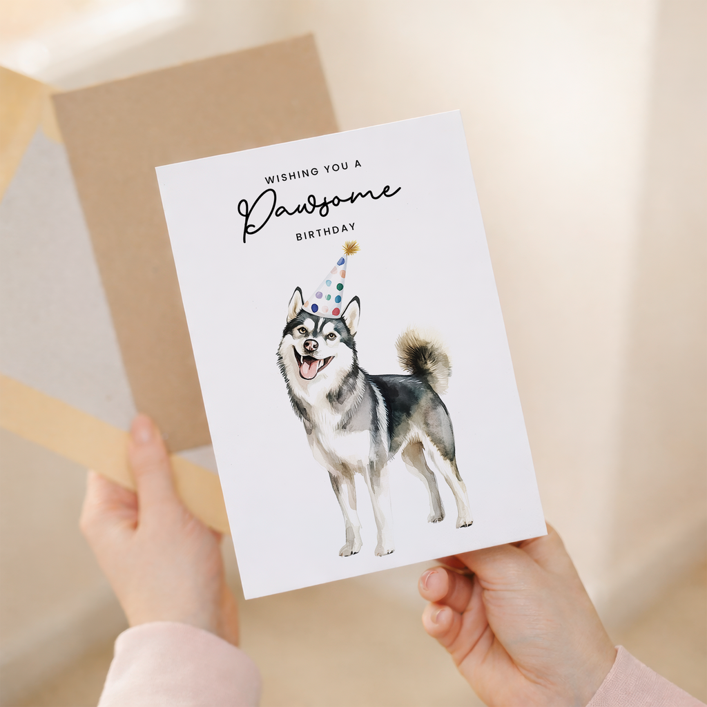 Husky birthday card featuring a cute dog wearing a blue party hat and surrounded by colorful confetti and a bone.