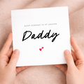 A simple and cute birthday greeting card for Daddy featuring a charming love hearts design on a white background.