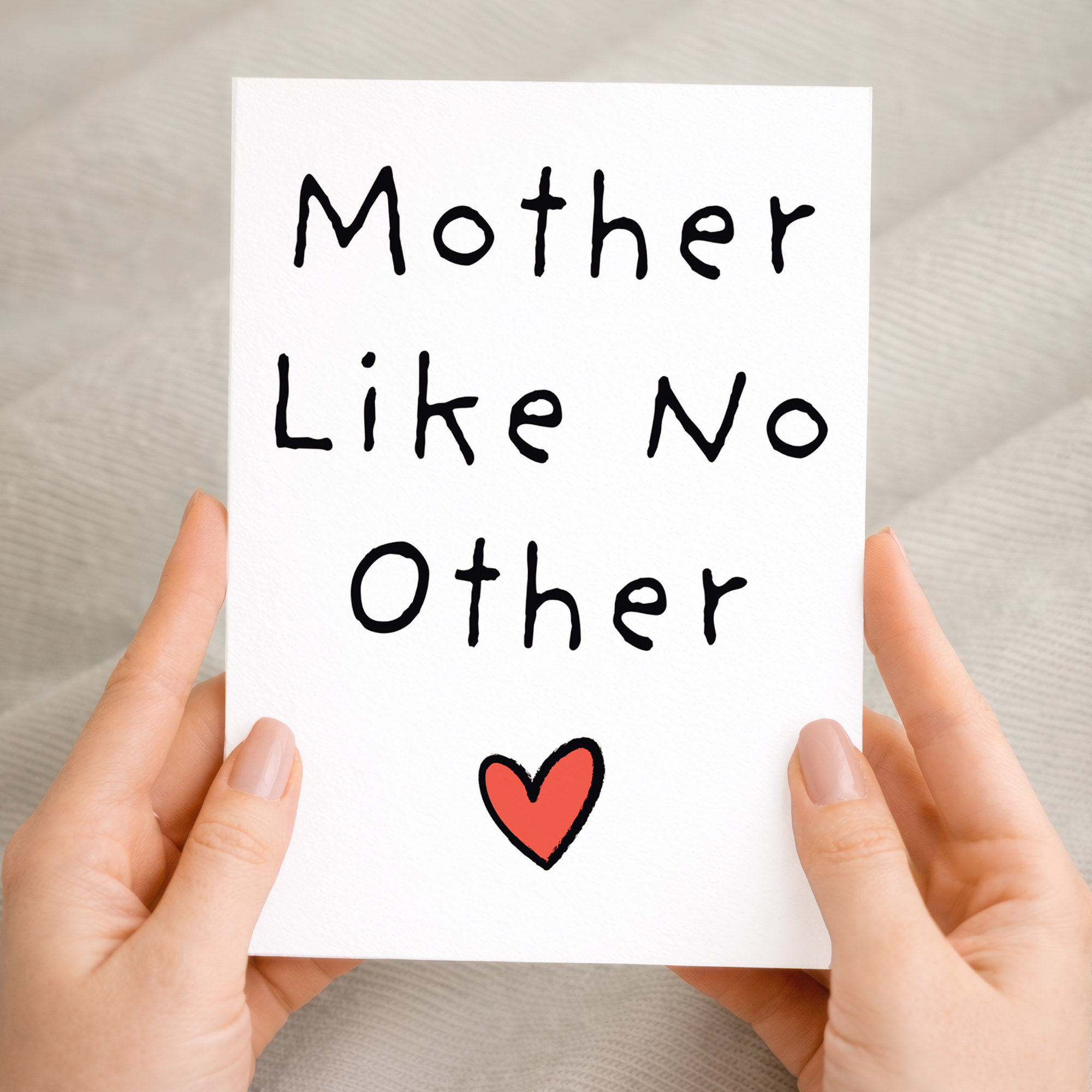 Elegant Mother's Day greeting card featuring a floral design with red and pink details on white sustainable cardstock, paired with a rustic brown Kraft envelope.