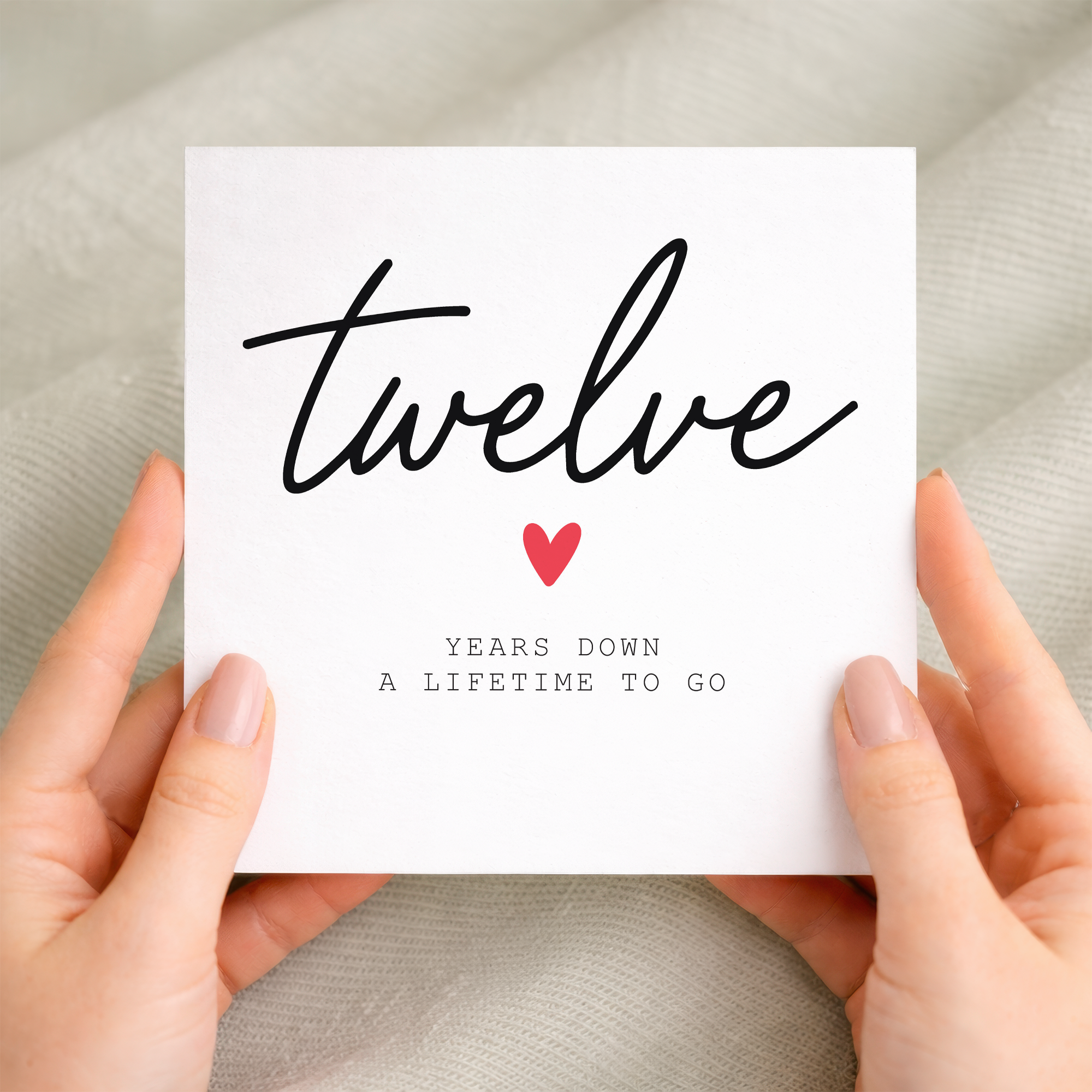 12th anniversary card for couple with handwritten twelve years down design