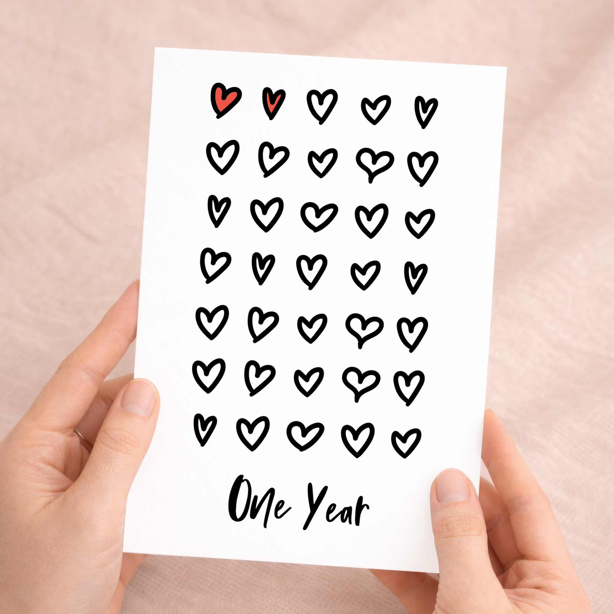 Elegant 2nd Wedding Anniversary greeting card featuring a minimalist design on sustainable recycled cardstock, paired with a rustic brown Kraft envelope.