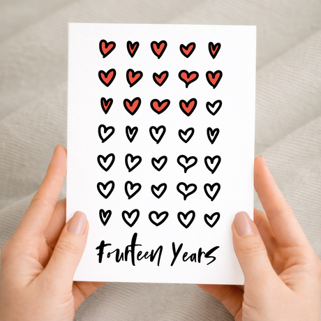 Elegant 14th Wedding Anniversary greeting card with a minimalist design on eco-friendly recycled cardstock, paired with a rustic brown Kraft envelope.