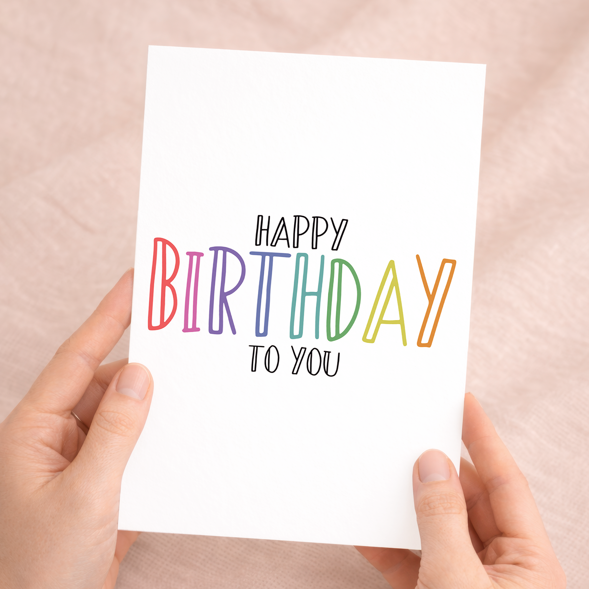 Charming 5x7 inch birthday greeting card printed on sustainable recycled cardstock, featuring a festive Happy Birthday design and paired with a brown Kraft envelope.
