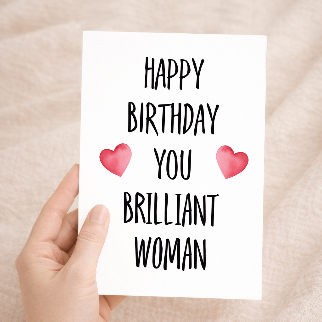 Vibrant birthday greeting card featuring the text You Brilliant Woman in colorful, decorative lettering surrounded by delicate floral patterns on eco-friendly cardstock, accompanied by a brown Kraft envelope.