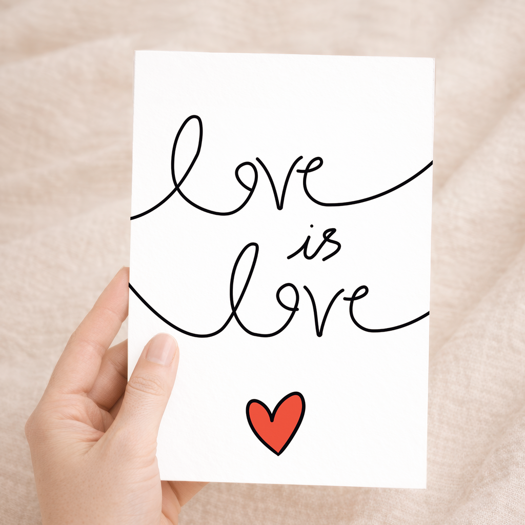 Elegant anniversary greeting card featuring colorful "Love is Love" script text surrounded by delicate floral designs and hearts on a white background, paired with a rustic brown Kraft envelope.