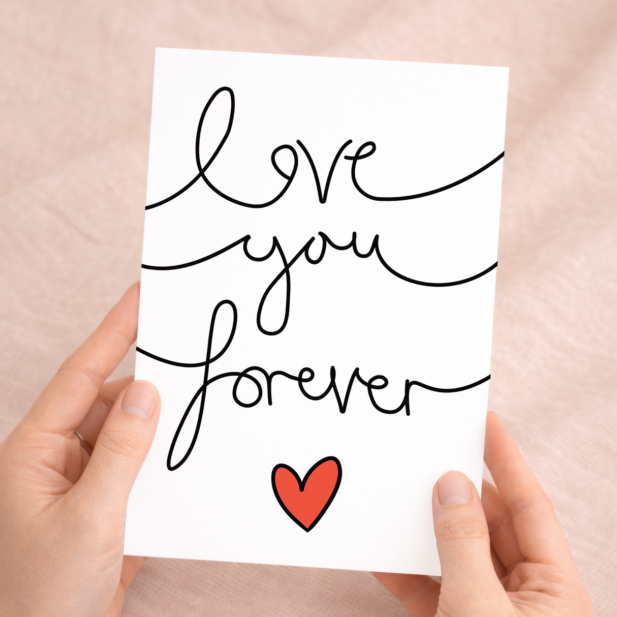 Elegant anniversary or Valentine's Day greeting card featuring the message Love You Forever in stylish script on sustainable cardstock, paired with a brown Kraft envelope.