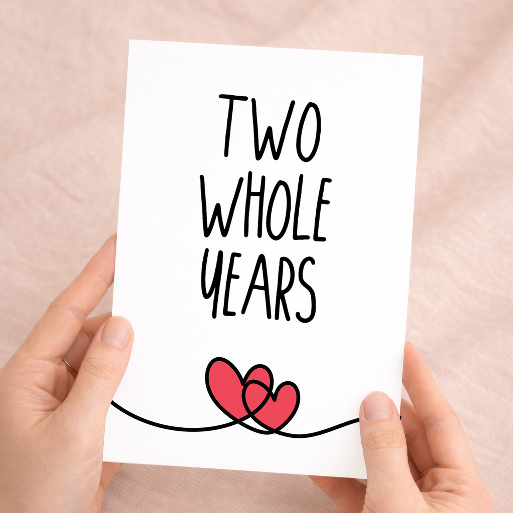 Elegant 2nd-anniversary greeting card for a partner, featuring a romantic design on sustainable recycled cardstock, paired with a rustic brown Kraft envelope.