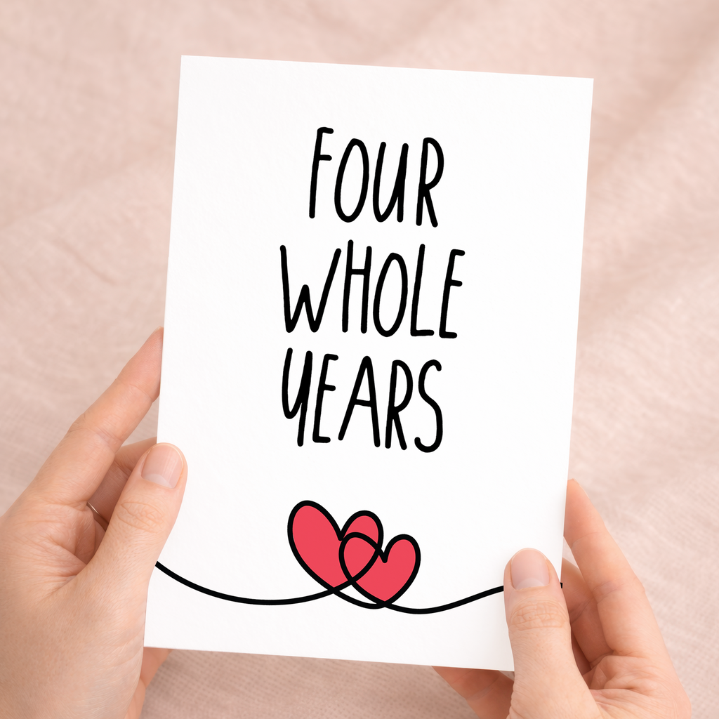An elegant 4th anniversary greeting card featuring a minimalist design on eco-friendly, recycled cardstock, paired with a rustic brown Kraft envelope.