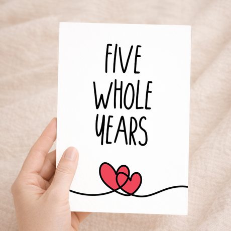 Charming 5th anniversary greeting card featuring a simple, elegant design on sustainable recycled cardstock, paired with a matching brown Kraft envelope.