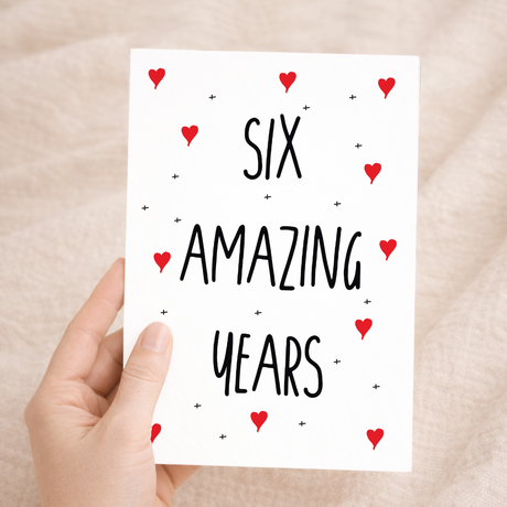 Elegant 6th wedding anniversary greeting card with a simple, modern design on recycled cardstock, accompanied by a sustainable brown Kraft envelope.