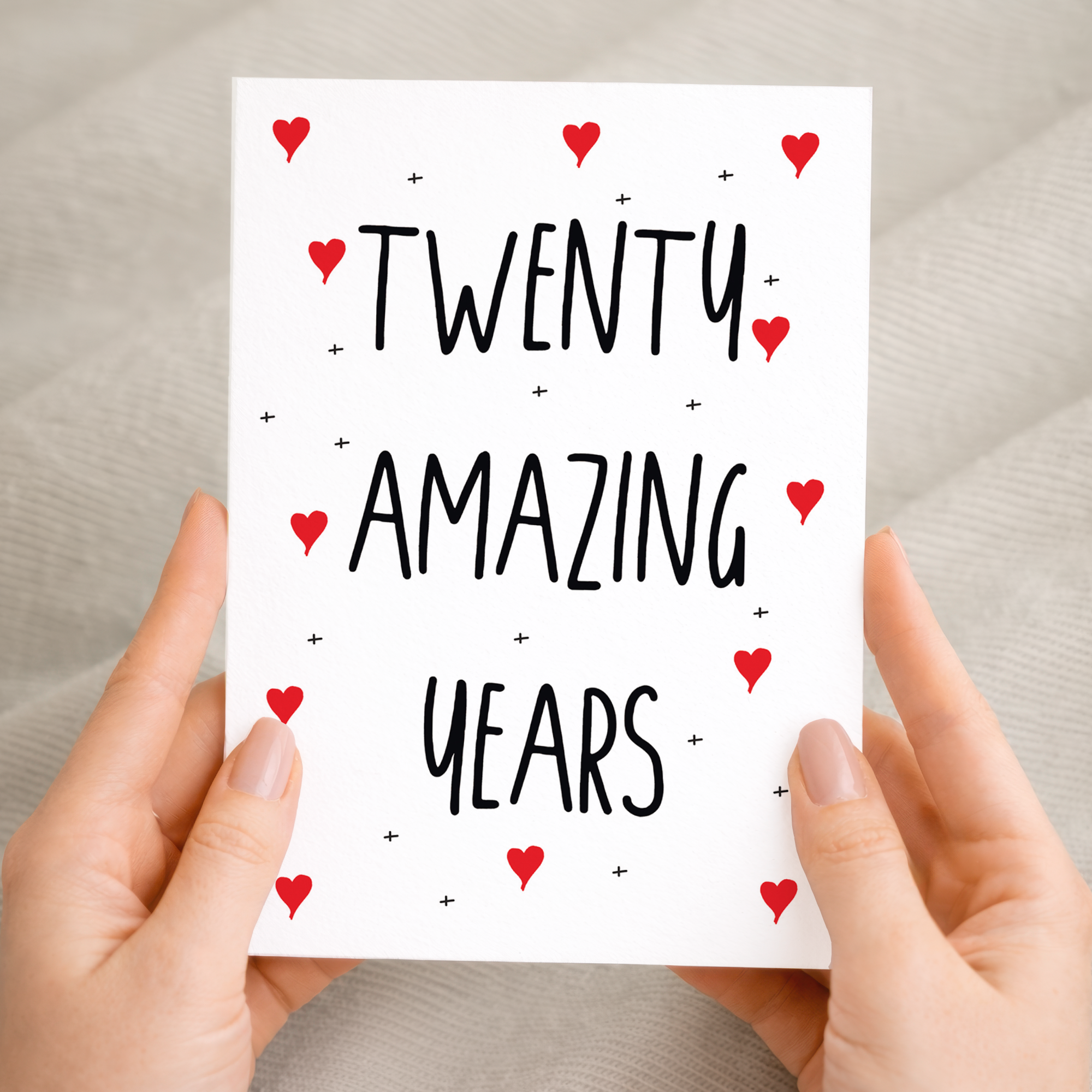 Elegant 20th Anniversary greeting card featuring a clean, minimalist design with a recycled brown kraft envelope on a sustainable cardstock background.