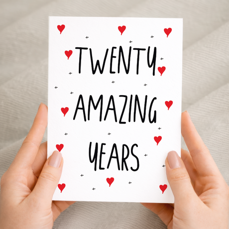 Elegant 20th Anniversary greeting card featuring a clean, minimalist design with a recycled brown kraft envelope on a sustainable cardstock background.