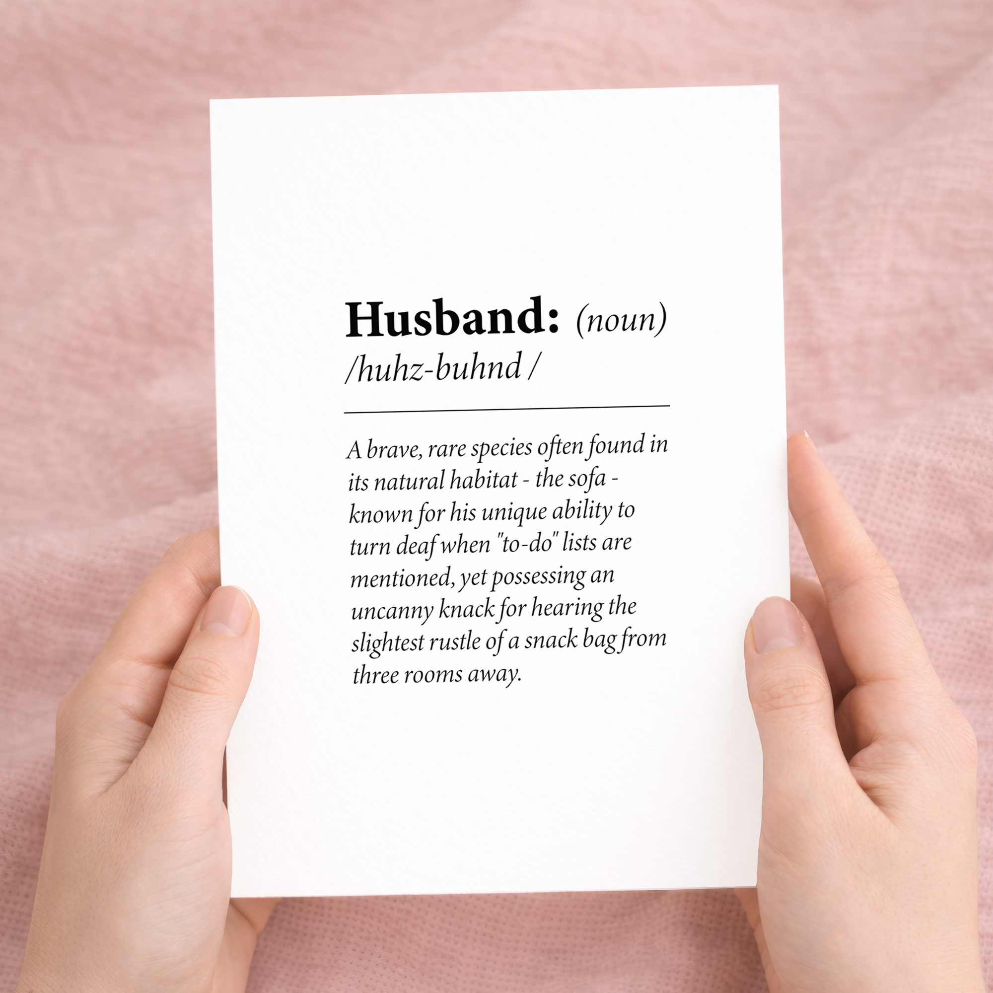 Funny dictionary-style birthday card for a husband featuring a humorous definition of the word Husband on eco-friendly cardstock, paired with a brown Kraft envelope.