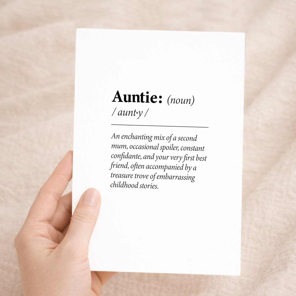 A humorous "Auntie" dictionary-style birthday greeting card featuring a witty definition on sustainable recycled cardstock, paired with a brown Kraft envelope.