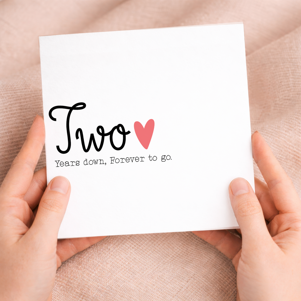 A romantic 2nd wedding anniversary card for a husband or wife featuring a clean letters and numbers design and a recycled brown kraft envelope.