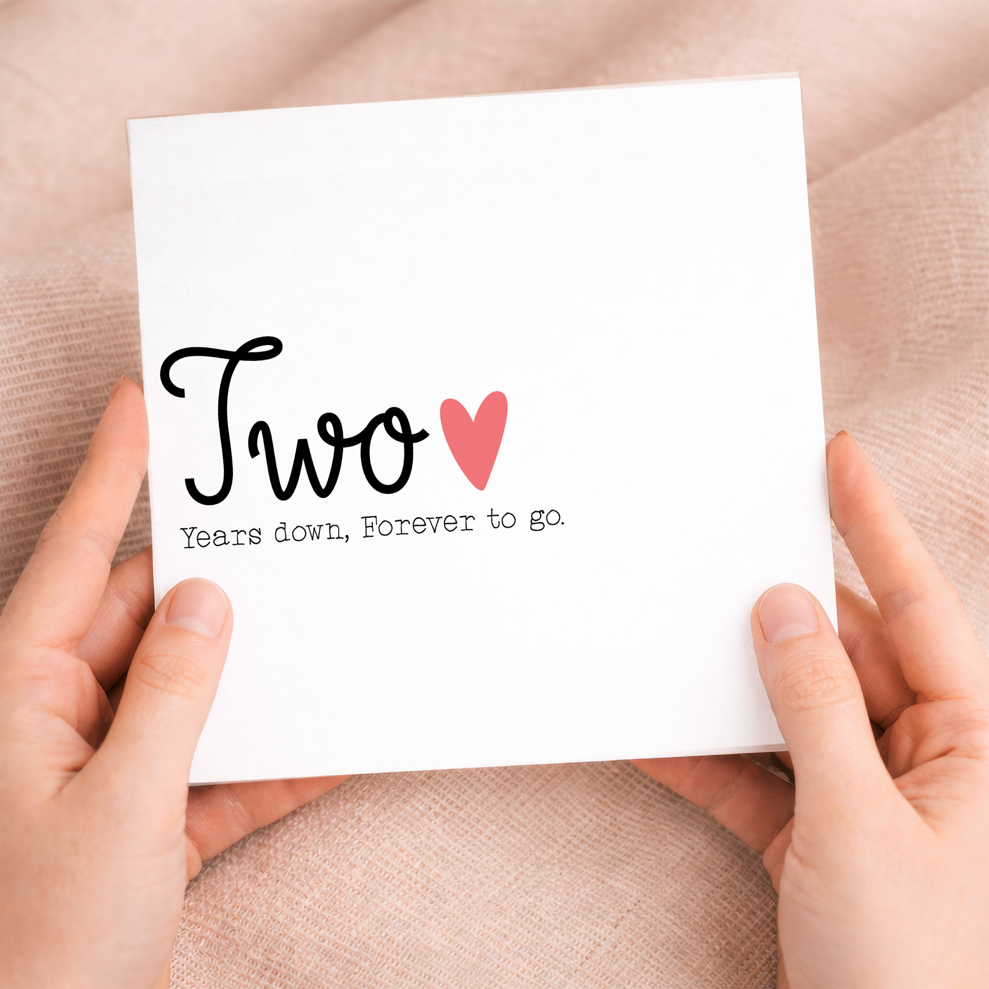 A romantic 2nd wedding anniversary card for a husband or wife featuring a clean letters and numbers design and a recycled brown kraft envelope.