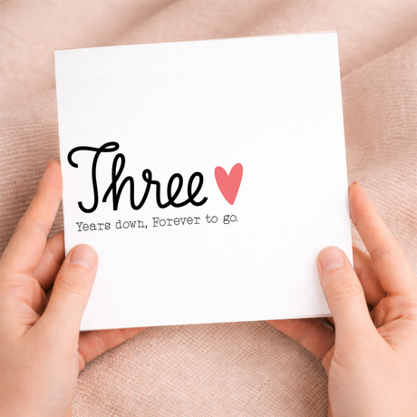 A simple and romantic 3rd wedding anniversary greeting card for a wife or husband featuring a minimalist design on a white background.