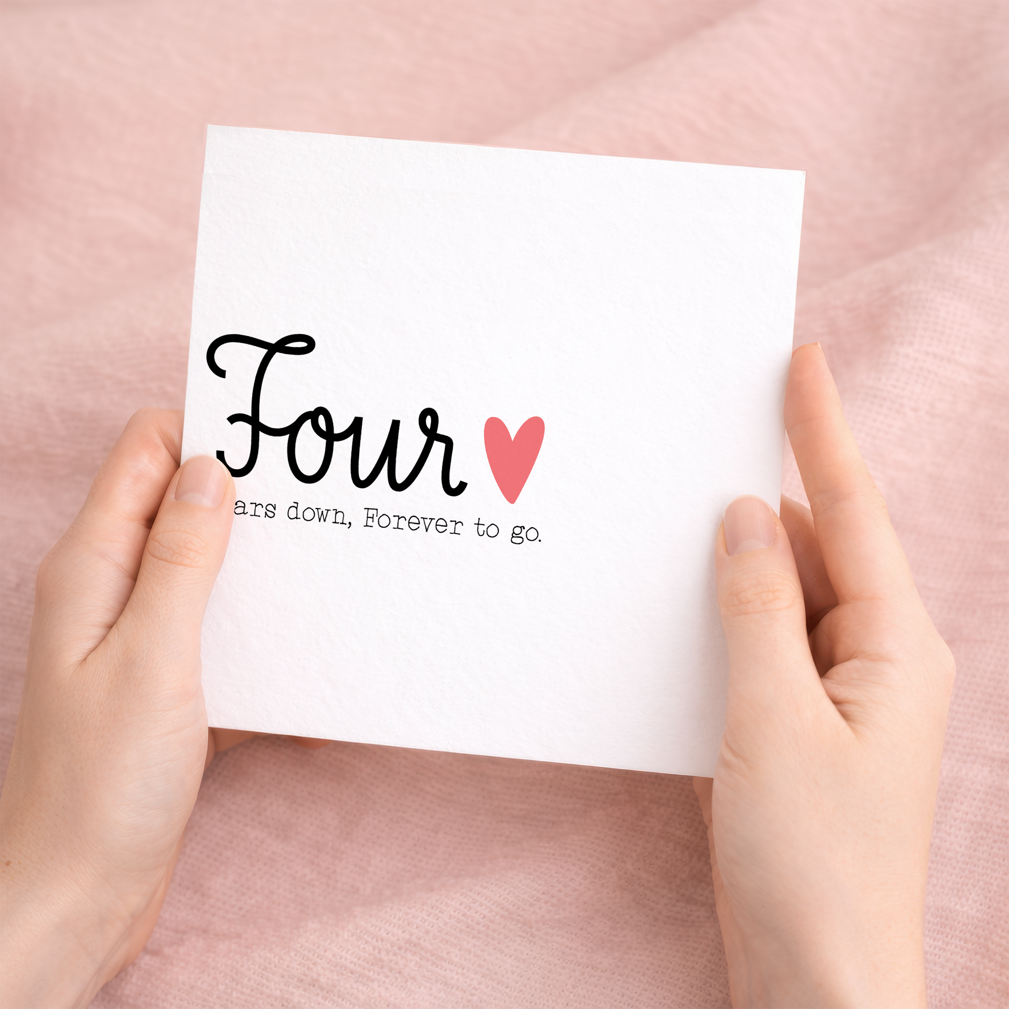 A simple and elegant 4th wedding anniversary greeting card for a wife or husband featuring a letters and numbers design on a white background.