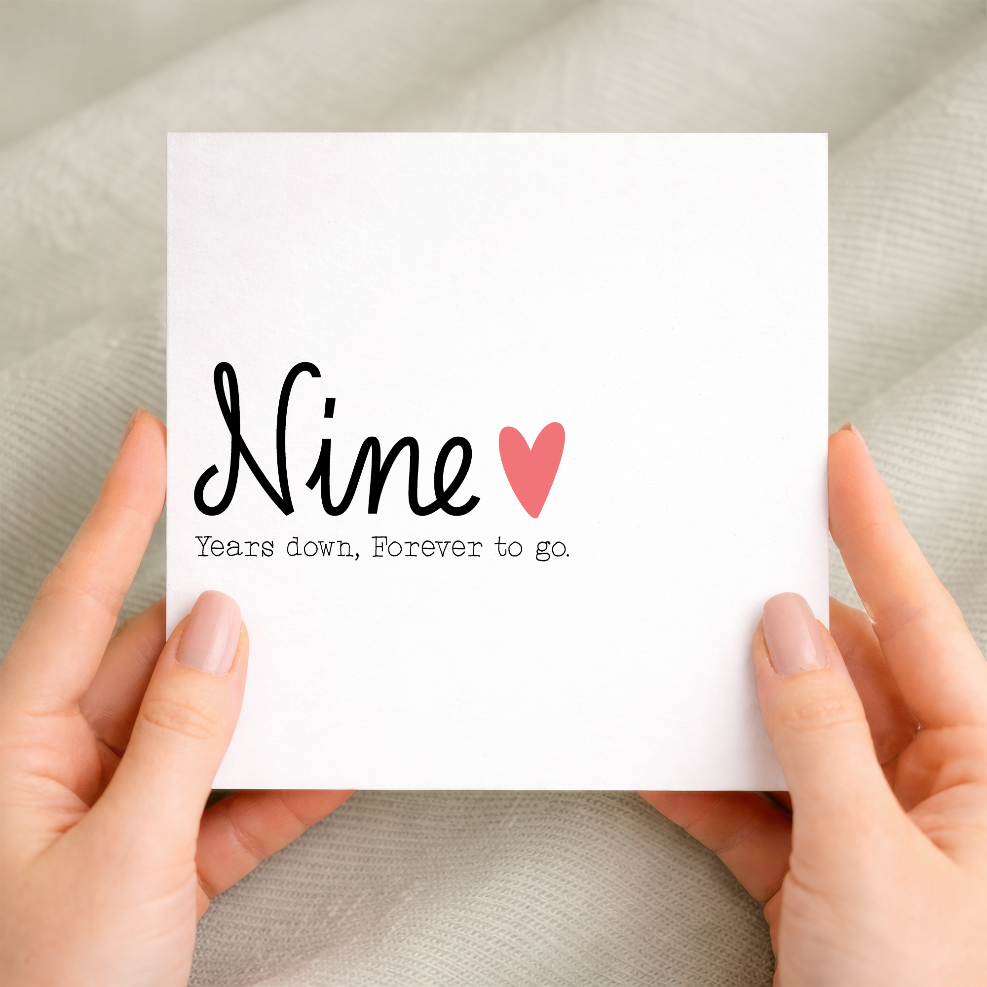A romantic 9th wedding anniversary greeting card featuring a charming design for a wife or husband on a white background.
