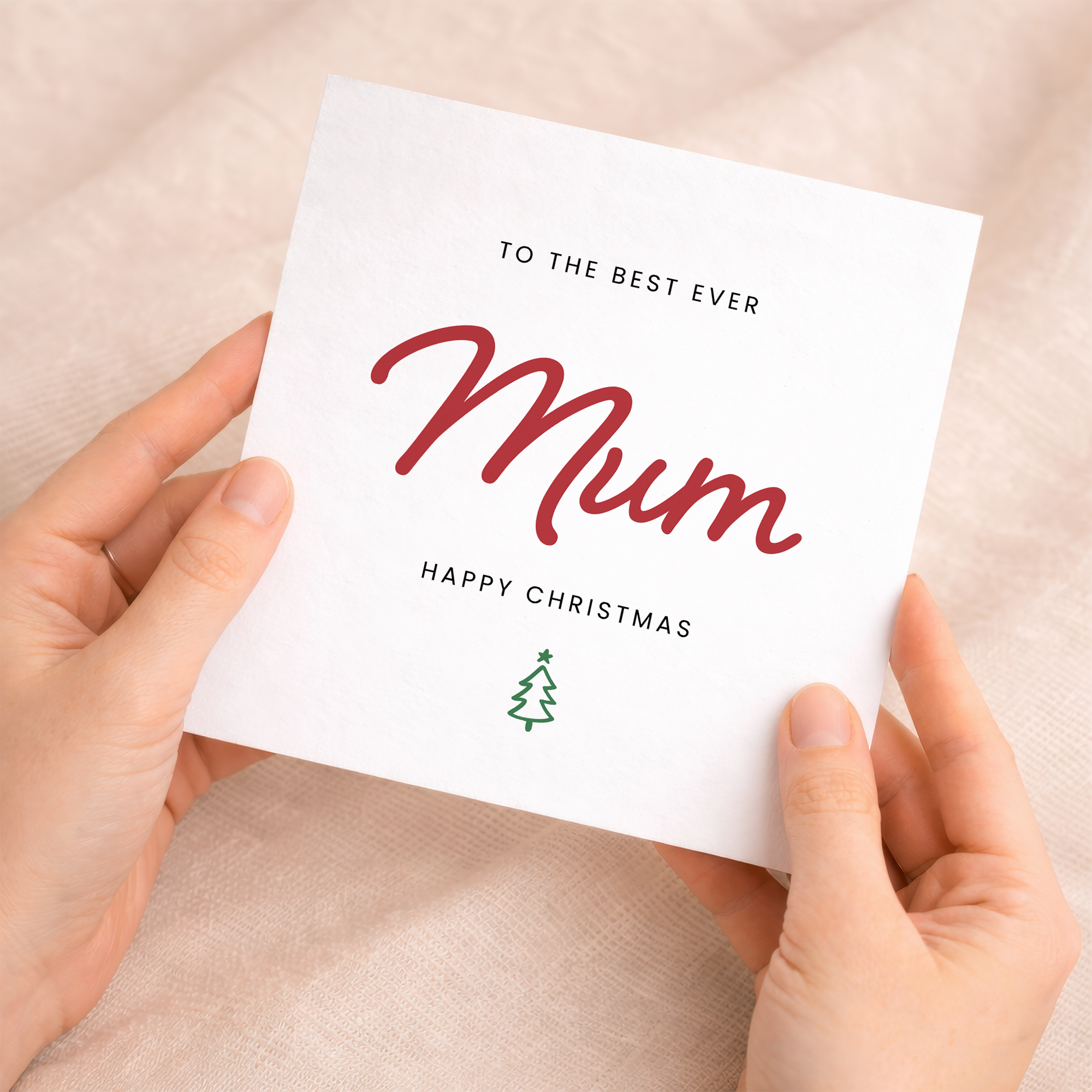 A festive Christmas greeting card for Mum featuring a stylish "Best Mum Ever" design with decorative lettering and a holiday theme.
