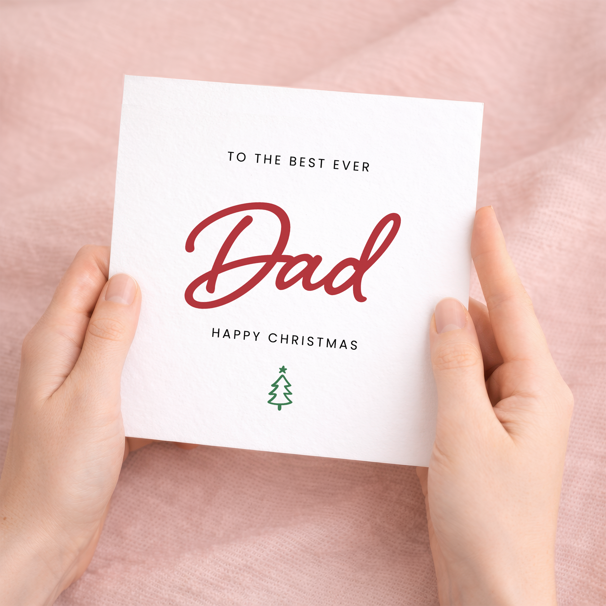A Christmas greeting card for Dad featuring a festive design with letters and numbers on a clean background.