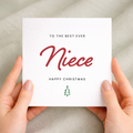A simple and cute Christmas greeting card for a niece featuring a festive "Best Niece Ever" design on a white background.