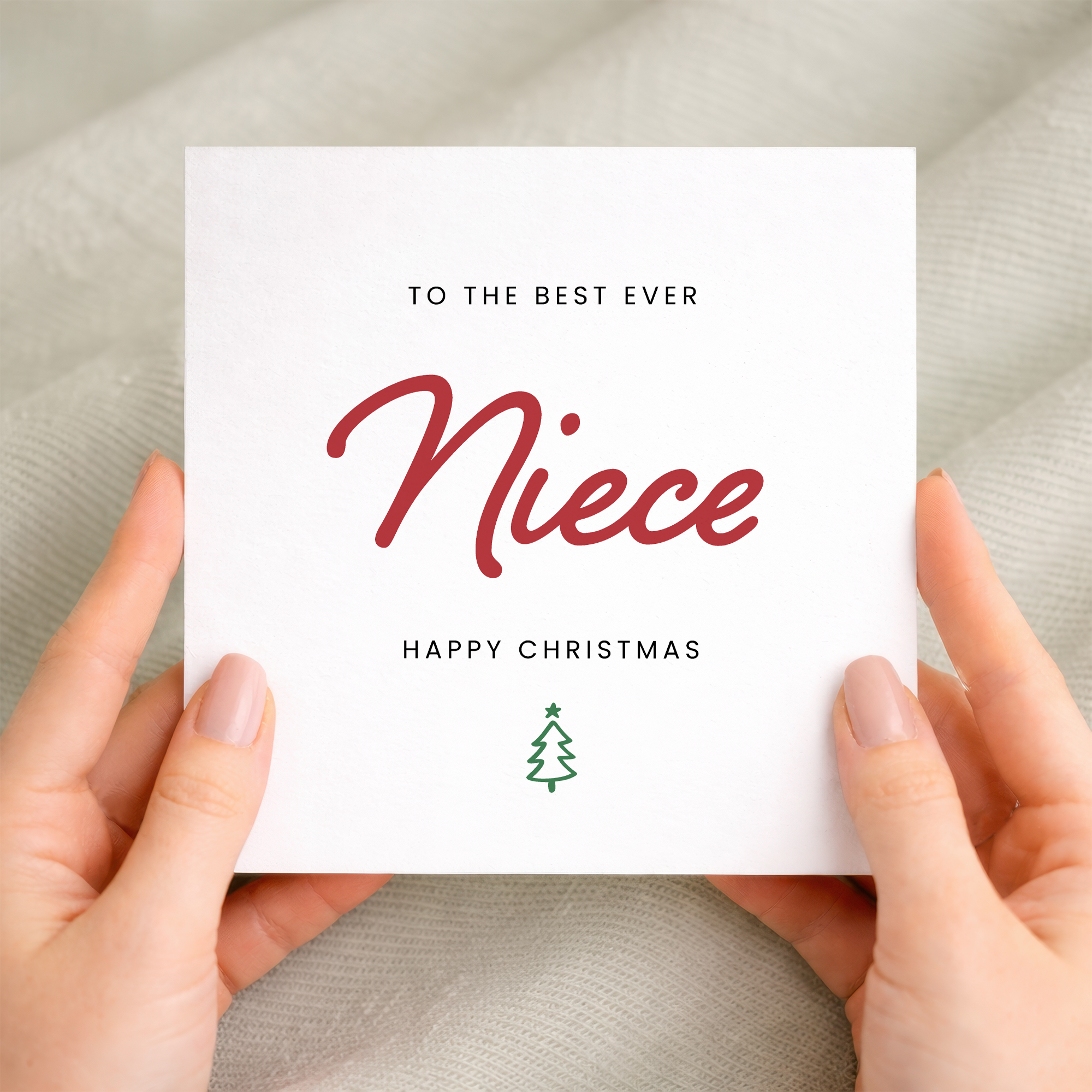 A simple and cute Christmas greeting card for a niece featuring a festive "Best Niece Ever" design on a white background.