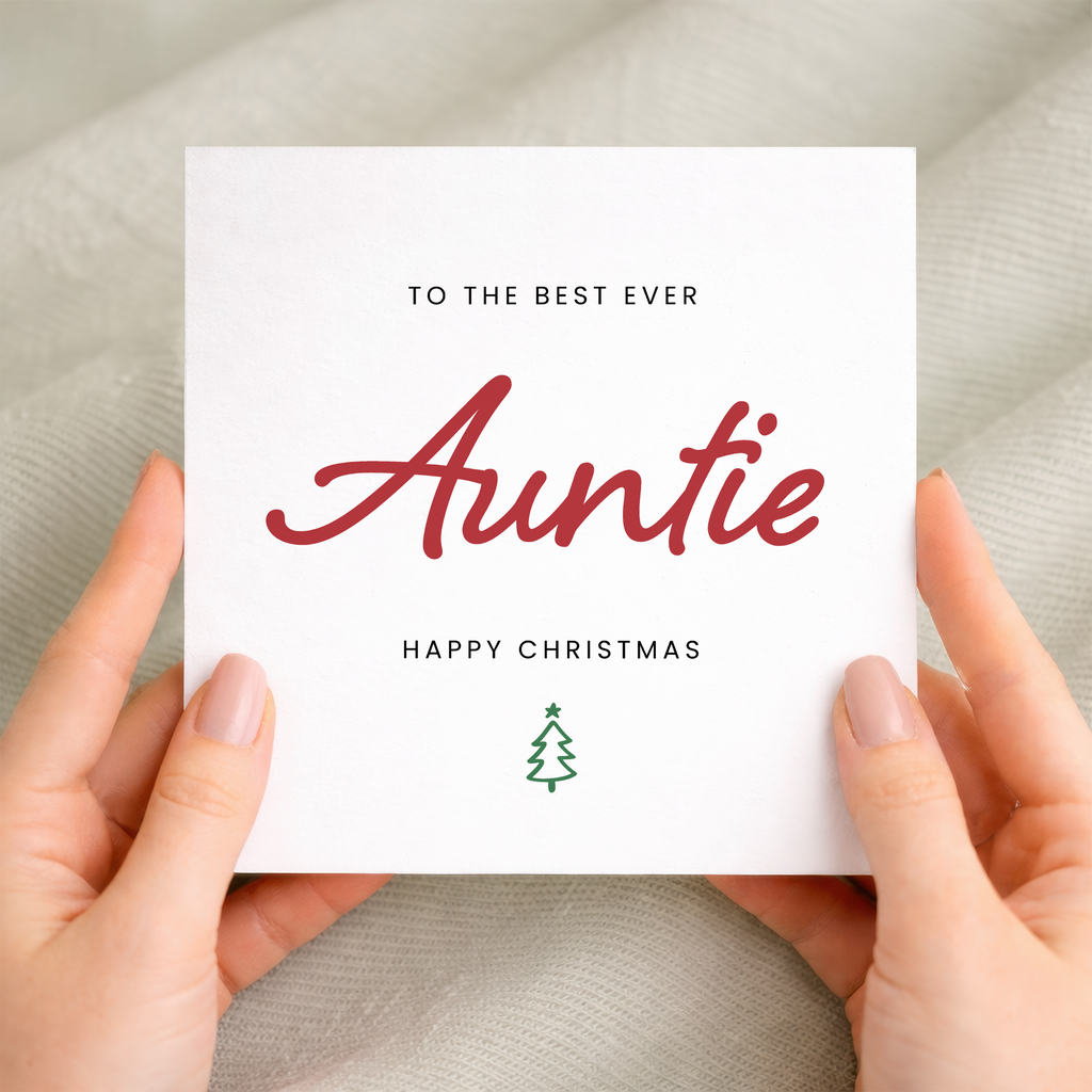 A festive Christmas greeting card for Auntie featuring a Best Auntie Ever typographic design on a white background.