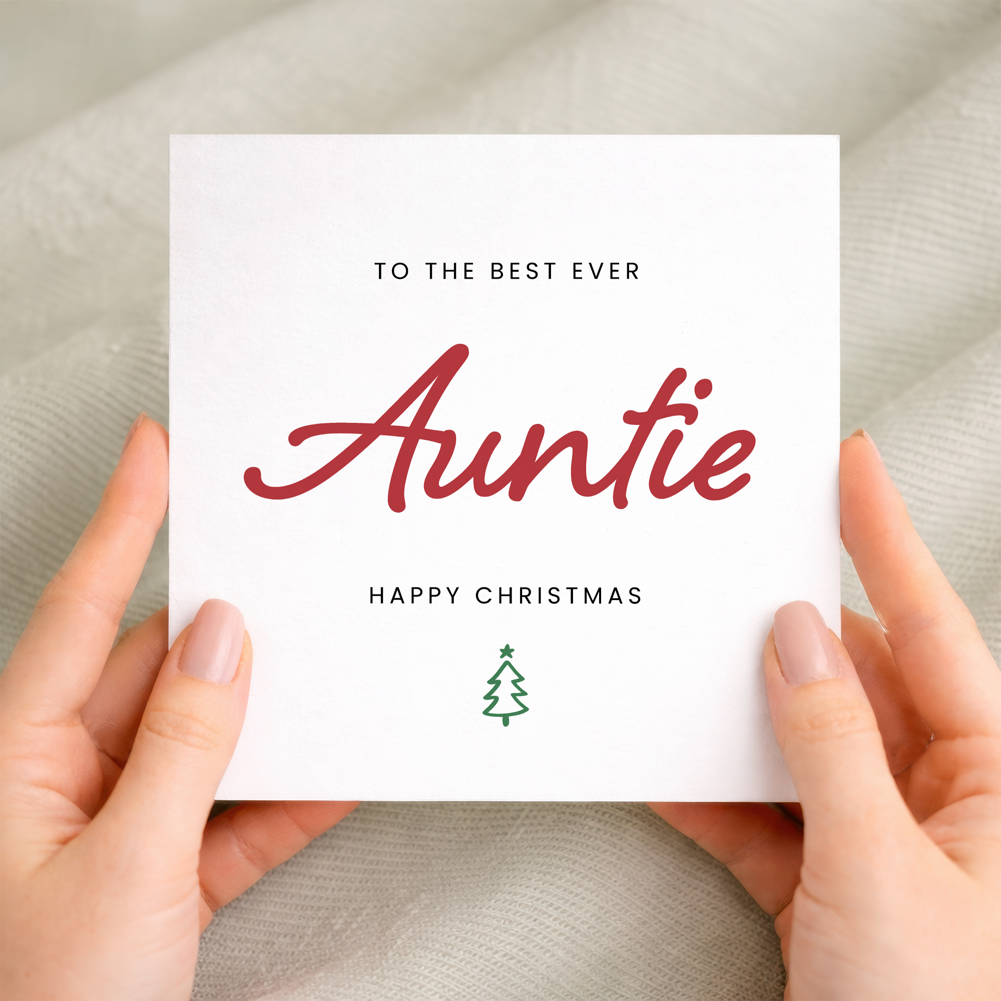 A festive Christmas greeting card for Auntie featuring a Best Auntie Ever typographic design on a white background.